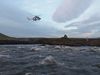 The national coastgurd helicopter on its way to rescue the man in the river.
