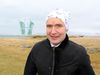 Guðni Th. Jóhannesson, President of Iceland wearing Buff headwear in the wind and rain yesterday.