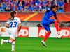 Fanndís Friðriksdóttir up against Elodie Thomis during the match against France.