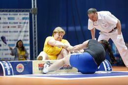 Two times Iceland's strongest woman, Þóra Þorsteinsdóttir wrestles with her opponent from Kyrgyztan, with Maria ...