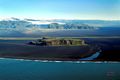 Höfðafjara. Hjörleifshöfði á sandinum. Hafursey og Kötlujökull í baksýn.