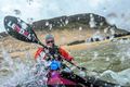 Kajakræðari Veiga Grétarsdóttir á leið frá Hænuvík yfir í Látravík. Sjór var stilltur en hún fann fyrir haföldu á leið fyrir Bjarnarnúp.