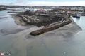 Bryggjuhverfi vestur Hið nýja hverfi mun rísa á landi sem Björgun hefur mótað með stórvirkum tækjum. Jaðar landfyllingar er styrktur með grjóti til að vernda byggðina fyrir ágangi sjávar.