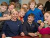 Lilja Alfreðsdóttir surrounded by Icelandic children at the launch of the latest version of Icelandic Online.