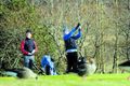 Milt veður Golfsettin viðruð á golfvelli á góðviðrisdegi í marsmánuði.