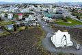 Kópavogur Horft yfir bæinn og Kópavogskirkja er fremst.